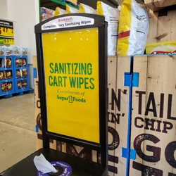 Super 1 Foods Fuel Center - Sanitizing cart wipes at the entrance.