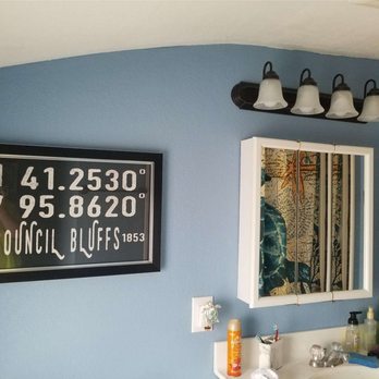 Transitions By Craftsmen - a bathroom with blue walls - Flooring Near Me - Council Bluffs, Iowa Transitions By Craftsmen - a bathroom with blue walls - Flooring Near Me - Council Bluffs, Iowa