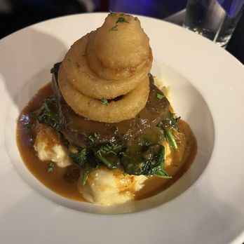 Bloom Botanical Bistro - Short rib special with blue cheese mash, sautéed spinach, and onion rings - New American Near Me - Queens, New York