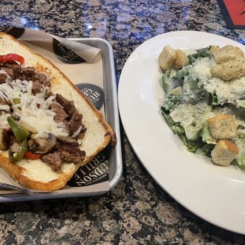 Hudson Grille - Burying Philly And side Caesar salad - American Near Me - Atlanta, Georgia Hudson Grille - Burying Philly And side Caesar salad - American Near Me - Atlanta, Georgia