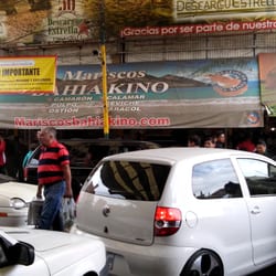 Descargue "estrella" - Los autos pueden pasar al Descargue y rodearlo, mientras algún pasajero se baja y hace compras.