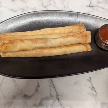 Tea Modern Chinese - Spring rolls with just shrimp and Sriracha on the side. No pork inside even though it's on the menu. - Tea Rooms Near Me - Orange, California Tea Modern Chinese - Spring rolls with just shrimp and Sriracha on the side. No pork inside even though it's on the menu. - Tea Rooms Near Me - Orange, California