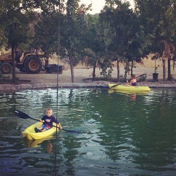 D & E Construction - two people kayaking in a lake - General Contractors Near Me - Visalia, California D & E Construction - two people kayaking in a lake - General Contractors Near Me - Visalia, California