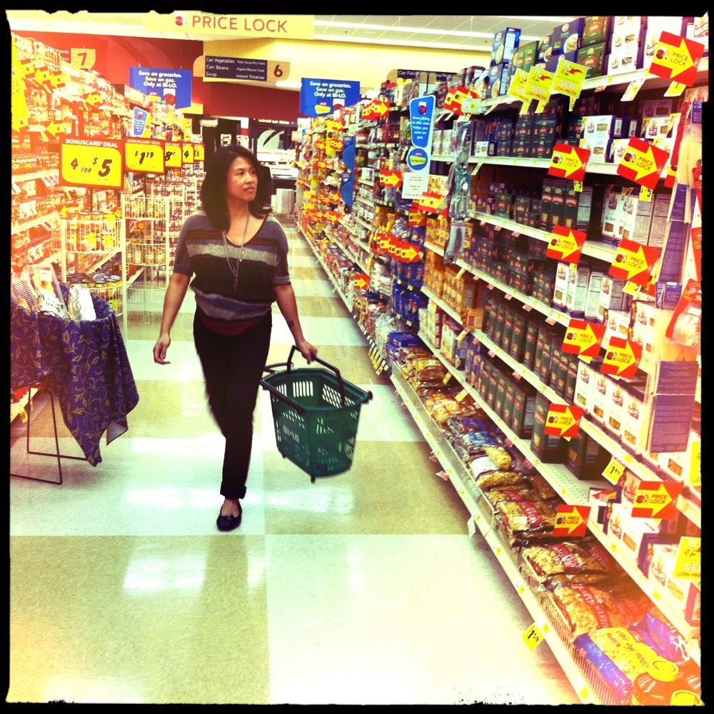 Bi-Lo - a woman walking down a grocery aisle - Drugstores Near Me - Hephzibah, Georgia