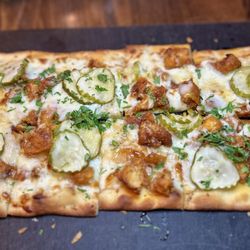 Five West - Nashville Hot Honey Crispy nashville chicken, hot honey, ranch, pickles, mozzarella & parsley.