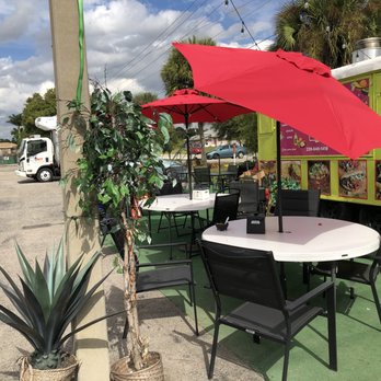 The Cactus Truck - Tables on the side of the truck - Food Trucks Near Me - Lehigh Acres, Florida