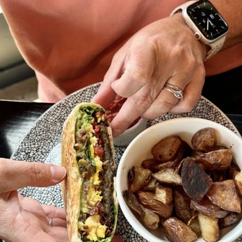MudPenny - Brunchwrap with bacon and potatoes on side! - New American Near Me - Ada, Michigan