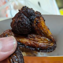 Golden Chick - Roast. Sad sad sad. Mind you that's my finger nail  compared to the size of the wing.