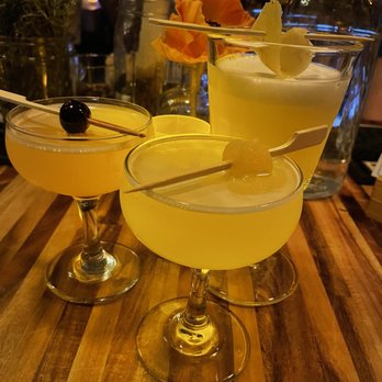 Knee High Stocking - Pear of lemons in front - Cocktail Bars Near Me - Seattle, Washington
