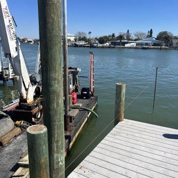 Edge Marine Construction - First of four lift support pilings accurately lining up the second piling position. - General Contractors Near Me - St. Petersburg, Florida Edge Marine Construction - First of four lift support pilings accurately lining up the second piling position. - General Contractors Near Me - St. Petersburg, Florida