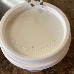 Strasburg Espress Coffee Shop - Cute cow sticker covering the opening