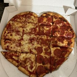 Chely's Pizza - Delicious heart-shaped pizza 1/2 Hawaiian 1/2 Pep One of favorites from here!
