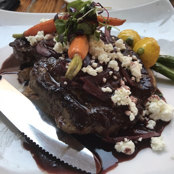 Fig Tree Cafe - 10 oz strip topped with caramel used onion sauce and goat cheese served with roasted potatoes and grilled asparagus...so good! - Breakfast & Brunch Near Me - San Diego, California
