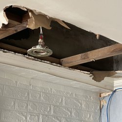 EGI Resort & Hotel - Ceiling damage from water damage caused by Penthpuse owned by condominium Mrs. Ganzon.