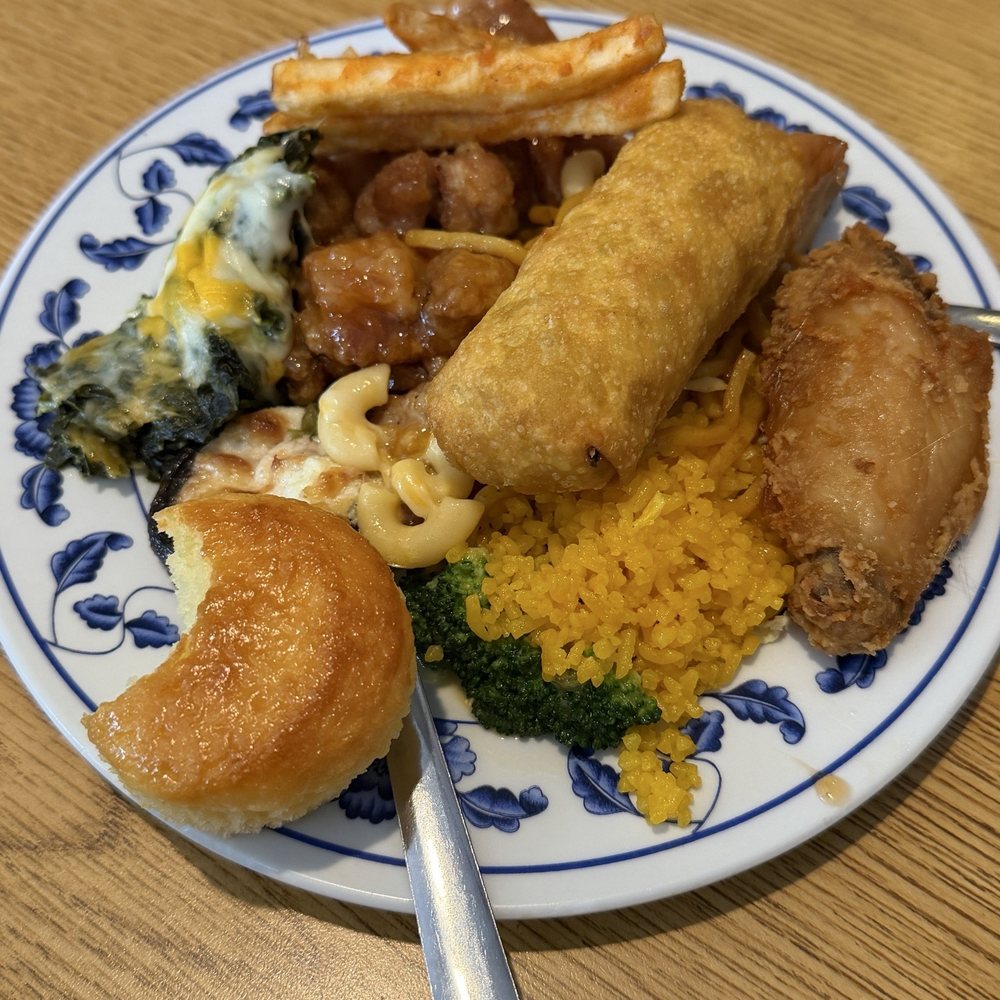 Sun King Chinese Restaurant - Plate with fried chicken, french fries, rice, macaroni, orange chicken, spinach with cheese, corn bread, chow mein.. - Chinese Near Me - Spartanburg, South Carolina