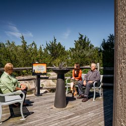 World War II Lookout Tower - Visitors at the Eternal Flame Memorial