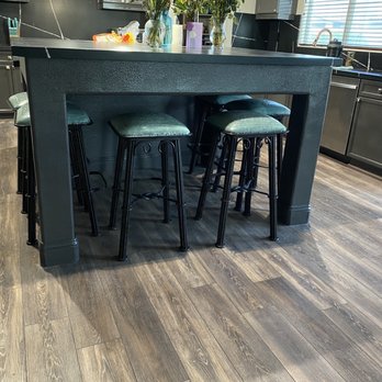 Angelo Building Group - a kitchen island with bar stools - General Contractors Near Me - Beaumont, California Angelo Building Group - a kitchen island with bar stools - General Contractors Near Me - Beaumont, California