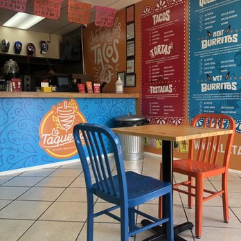 La Taqueria - a table and two chairs - Mexican Near Me - Hicksville, New York
