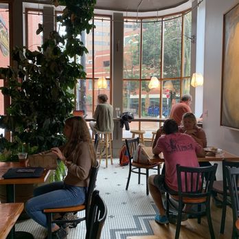 Arabica Coffee - people sitting at tables in a cafe - Coffee & Tea Near Me - Portland, Maine Arabica Coffee - people sitting at tables in a cafe - Coffee & Tea Near Me - Portland, Maine