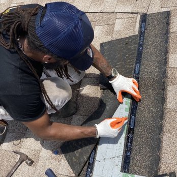 CHorne Roofing And Construction - a man working on a roof - General Contractors Near Me CHorne Roofing And Construction - a man working on a roof - General Contractors Near Me