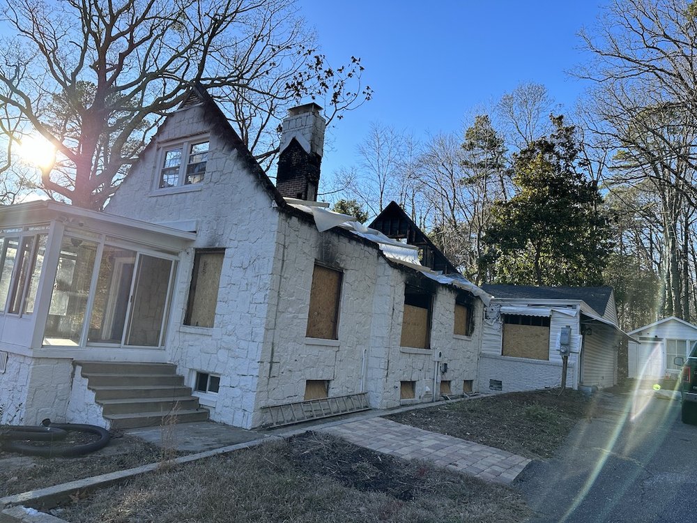 Slide of KM Roof and Home Repair