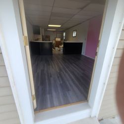 Nate’s Handyman Services - New flooring with painted cabinets