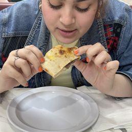 Enjoying stuffed dough