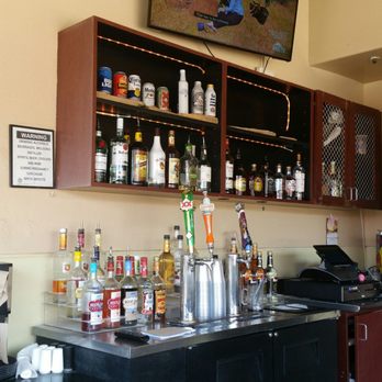 Cocina Cibola - a bar with a television on the wall - Juice Bars & Smoothies Near Me - Peoria, Arizona