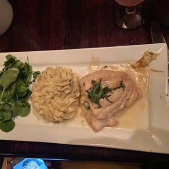 Rusty Pelican - Halibut with a cream sauce and plain mashed - Seafood Near Me - Tampa, Florida Rusty Pelican - Halibut with a cream sauce and plain mashed - Seafood Near Me - Tampa, Florida