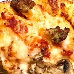 Mushroom & sausage pizza. The crust is amazing.