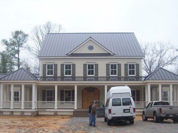 Slide of Patch Adams Roofing