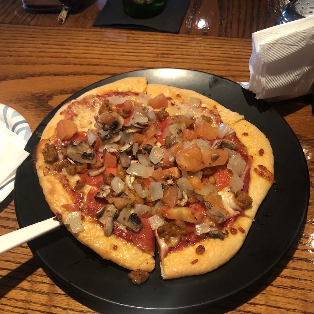 Full Moon Saloon - We got all the fixings on our pizza, made to order. - Sports Bars Near Me - Sedona, Arizona
