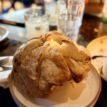 Piedra Santa - Artisan Rustic Bread with black truffle butter candle - Steakhouses Near Me - San Diego, California Piedra Santa - Artisan Rustic Bread with black truffle butter candle - Steakhouses Near Me - San Diego, California