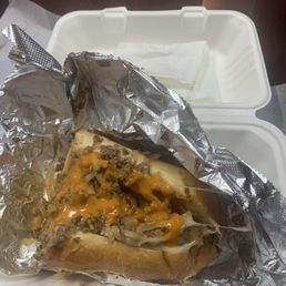 Cheesesteak (onions, hot peppers. Provolone cheese, and a drizzle of a pepper flavor sauce)