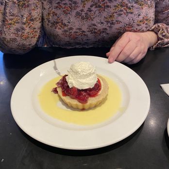 O Henry Hotel - Sour cream cheesecake with a shortbread crust, cherry jam - Hotels Near Me - Greensboro, North Carolina O Henry Hotel - Sour cream cheesecake with a shortbread crust, cherry jam - Hotels Near Me - Greensboro, North Carolina