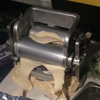 Tacos Hernandez - the dough being made by a machine - Tacos Near Me - Los Angeles, California Tacos Hernandez - the dough being made by a machine - Tacos Near Me - Los Angeles, California
