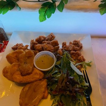 Sapoara - Garlic parm wings and chicharon de Pollo with tostones yum - Latin American Near Me - New York, New York