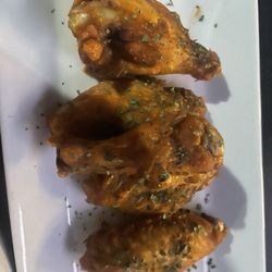 Yummies Food Lounge - Chicken wings...I ate a couple before pic was taken!