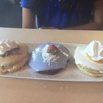 My Cafe - Flight of pancakes for #KidABartolome she loved the Cookie butter (far left) with the Lilikoi (far right). - Breakfast & Brunch Near Me - Kapolei, Hawaii