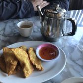 Photo of NG Cafe - Austin, TX, United States. Crab Rangoon and jasmine tea