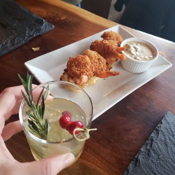 Jack Jones Bar - Shrimp over biscuits with a sausage gravy Cocktail: Honey monster irish whiskey spiced pear liquor fresh lime juice and rosemary - Irish Pub Near Me - Astoria, New York Jack Jones Bar - Shrimp over biscuits with a sausage gravy Cocktail: Honey monster irish whiskey spiced pear liquor fresh lime juice and rosemary - Irish Pub Near Me - Astoria, New York