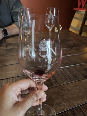 Photo of Icon Cellars - Woodinville, WA, US. a hand holding a wine glass
