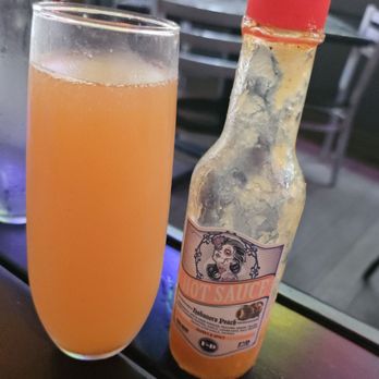 F&D Cantina - Mimosa with hot sauce - Mexican Near Me - Orlando, Florida