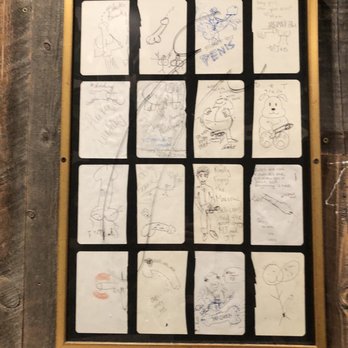 False Idol - Men's room art - Cocktail Bars Near Me - San Diego, California