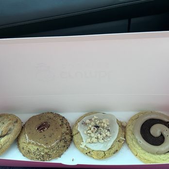 Crumbl - Athens - Black Friday cookies (L-R): Chocolate chip, caramel praline, cranberry crumb cake, maple cinnamon roll. - Bakeries Near Me - Athens, Georgia Crumbl - Athens - Black Friday cookies (L-R): Chocolate chip, caramel praline, cranberry crumb cake, maple cinnamon roll. - Bakeries Near Me - Athens, Georgia