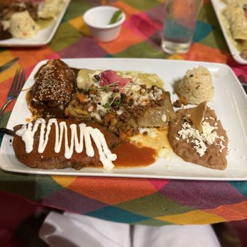 Gaby's - Sampler plate with chicken molé, stuffed poblano, tamalé, enchiladas and rice and beans! Hearty meal!!! - Mexican Near Me - Puerto Vallarta, JAL Gaby's - Sampler plate with chicken molé, stuffed poblano, tamalé, enchiladas and rice and beans! Hearty meal!!! - Mexican Near Me - Puerto Vallarta, JAL