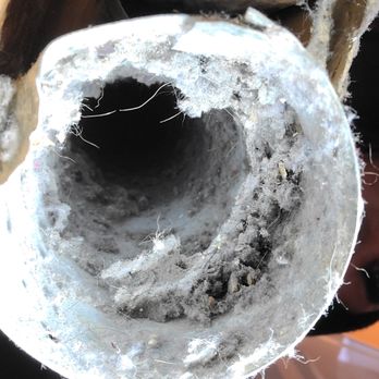 Dryersafe Solutions - Looking into a dryer vent going into the walls of a customer's home. - Air Duct Cleaning Near Me