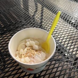 a bowl of yogurt on a table