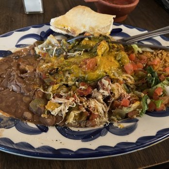El Pinto - Flat, chicken enchiladas with an egg over easy. - New Mexican Cuisine Near Me - Albuquerque, New Mexico El Pinto - Flat, chicken enchiladas with an egg over easy. - New Mexican Cuisine Near Me - Albuquerque, New Mexico