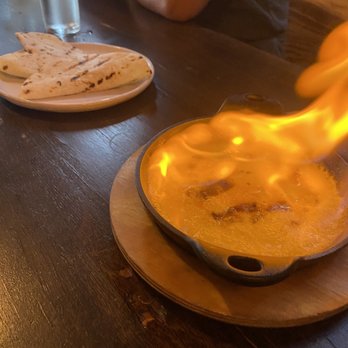 Frog & The Bull - Queso Flameado - Tapas Bars Near Me - Austin, Texas Frog & The Bull - Queso Flameado - Tapas Bars Near Me - Austin, Texas